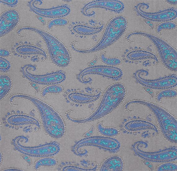 Detalle tejido Pajarita y pañuelo gris con paisley azul