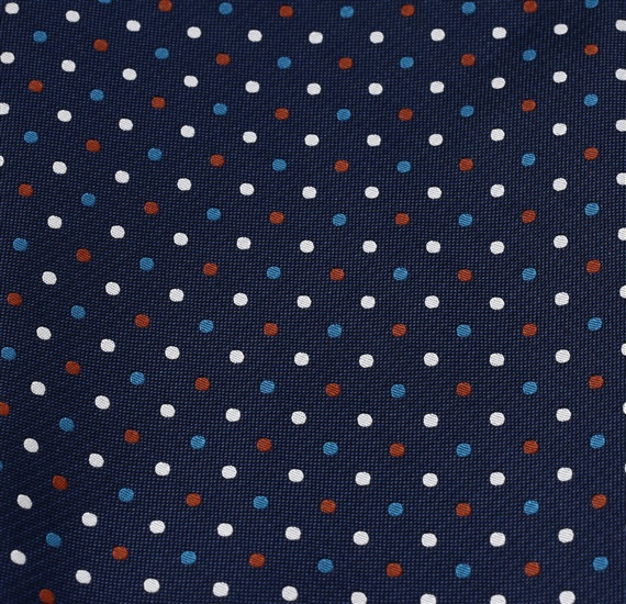 Tela pañuelo bolsillo azul marino con lunares