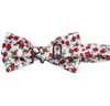 Revés pajarita blanca con flores rojas